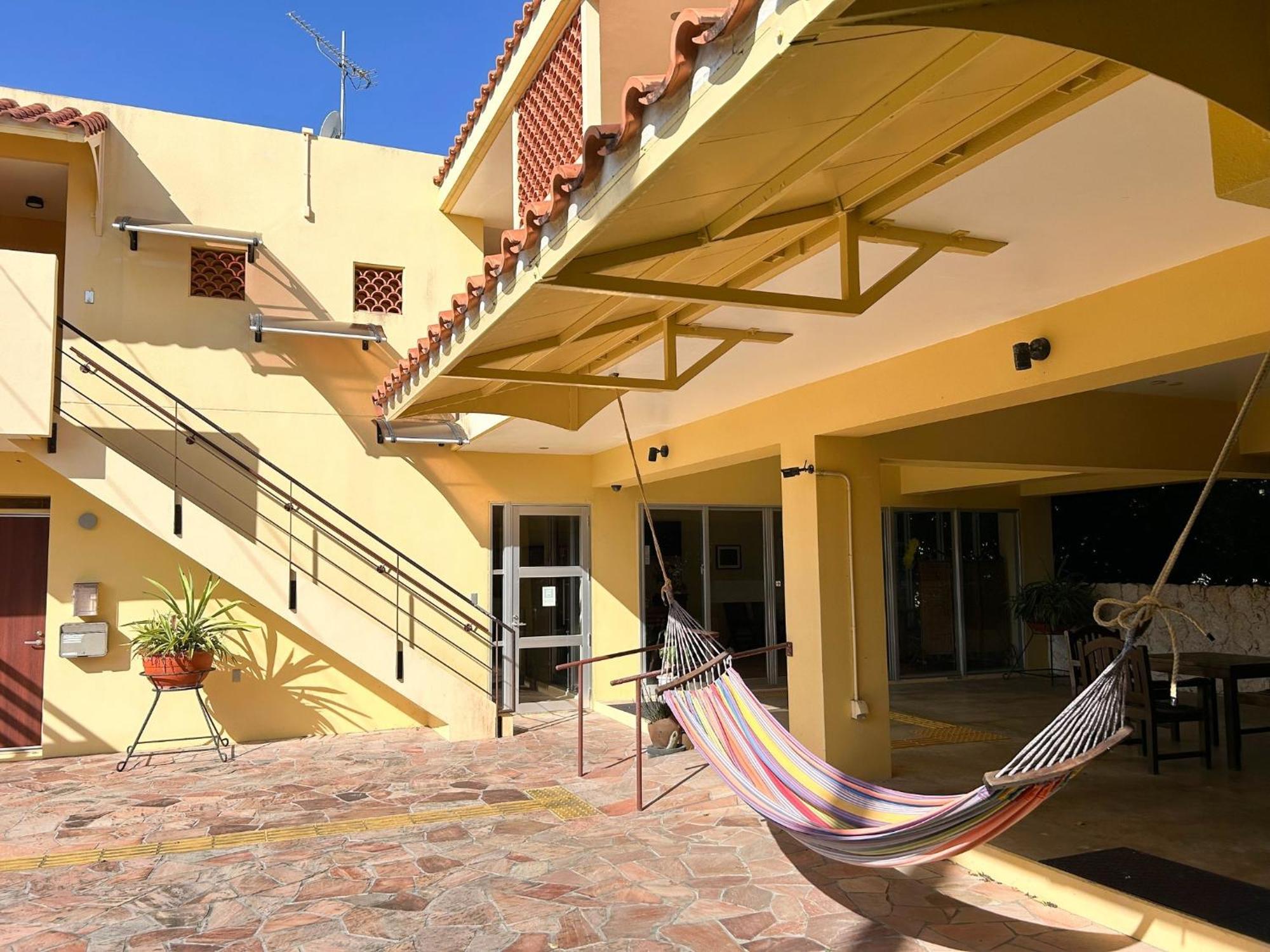 Pension Sunset Beach Nakijin Esterno foto